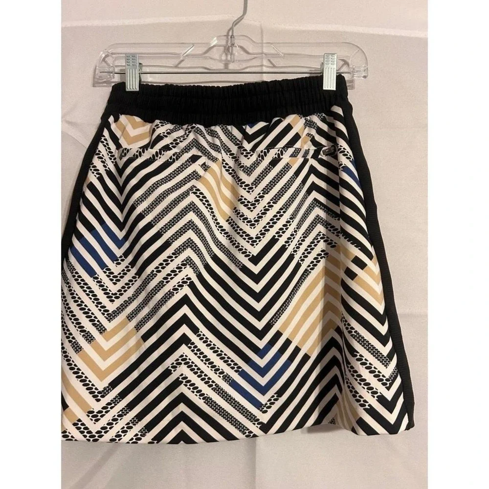 Tall brand tennis/pickleball skort like new XS‎ w pockets floral pleaded